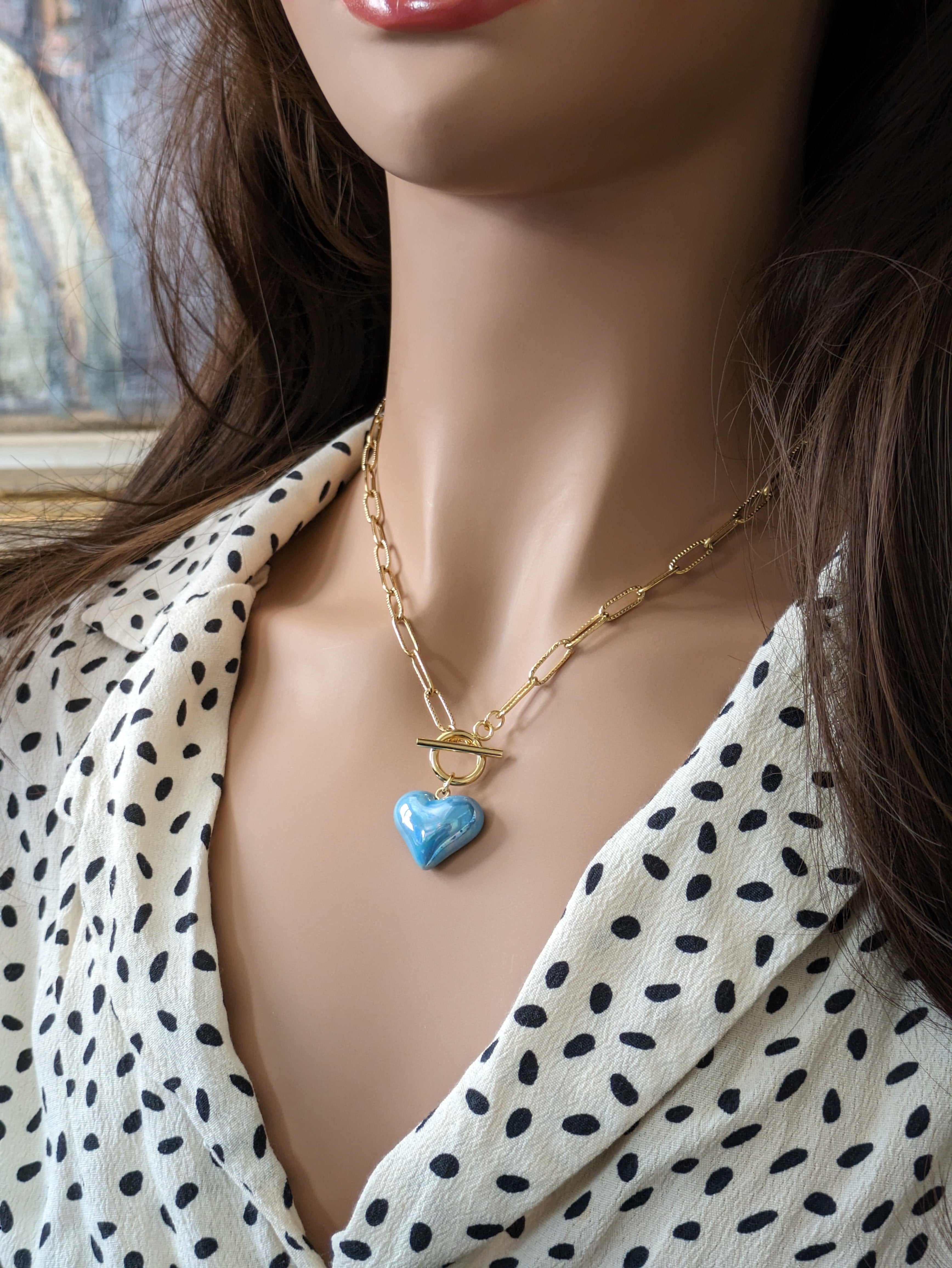 Collier cœur bleu lagon.