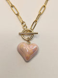 Collier cœur rose.